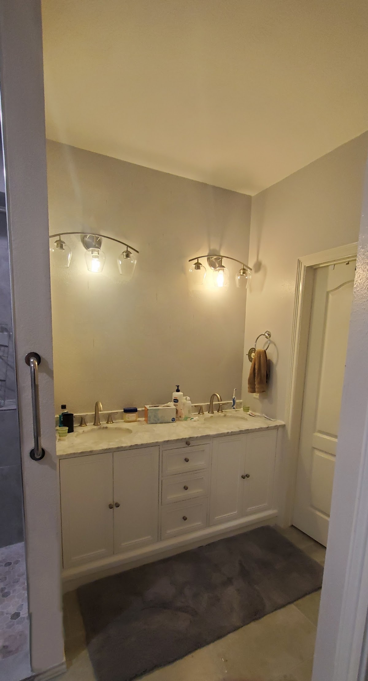 Completed bathroom renovation with double vanity
