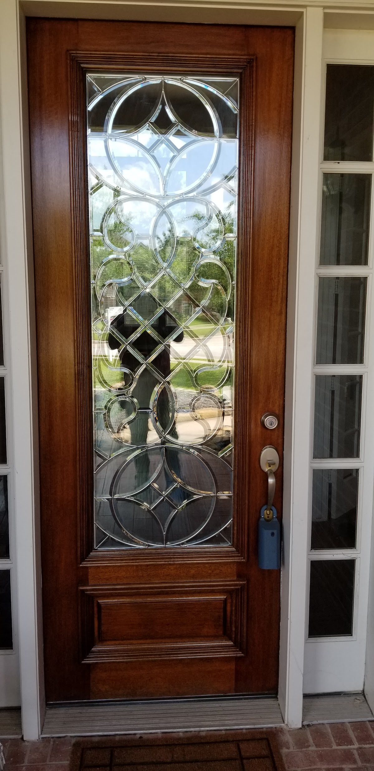 Refinished front entry door with leaded glass
